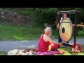 Gong Strikes Tibetan Monk in the Face