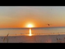 Закат на пляже Кейбл